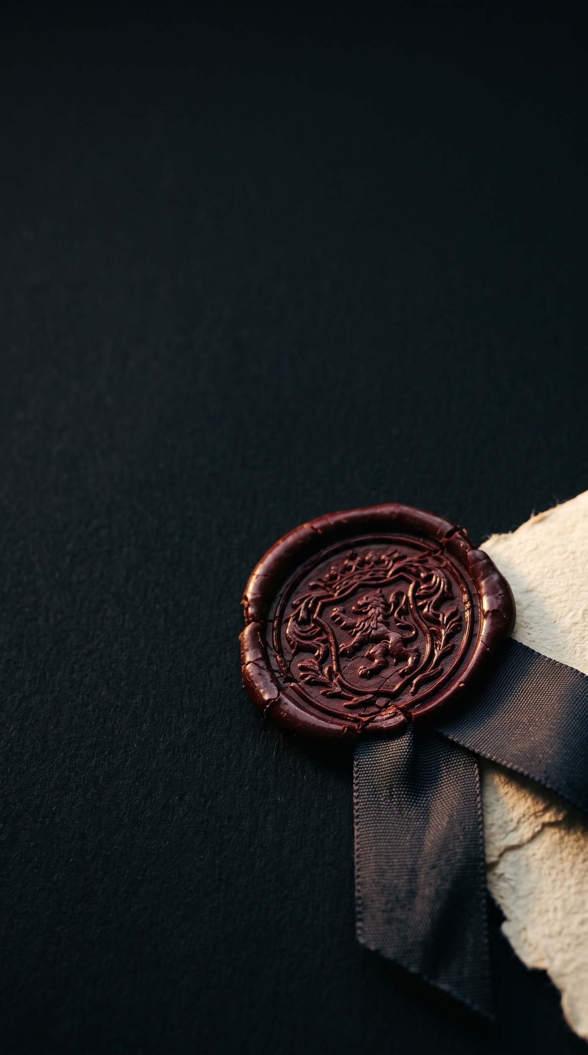Oxblood wax seal on a legal document